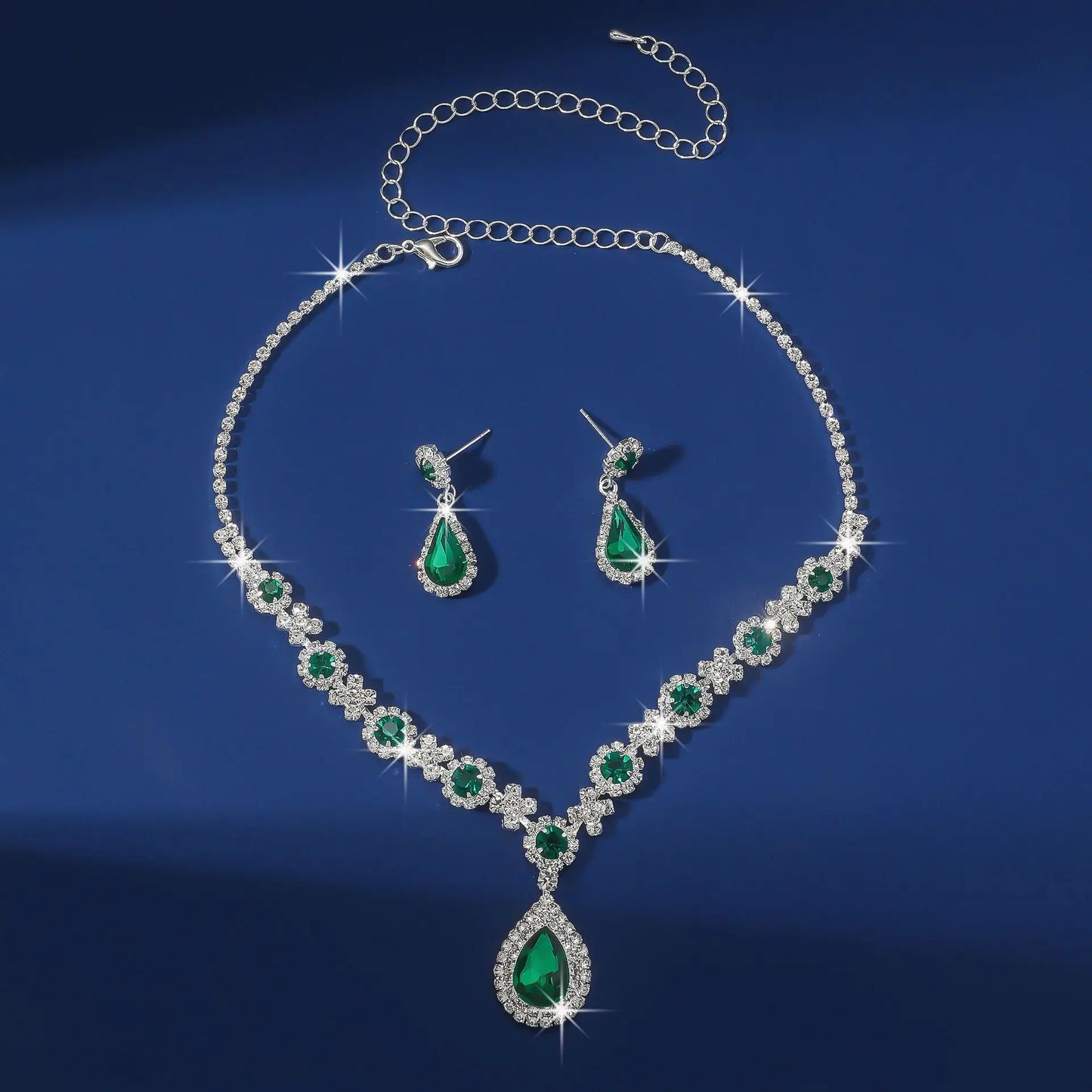 Elegant waterdrop rhinestone jewelry set featuring green gemstones and sparkling accents, perfect for women.