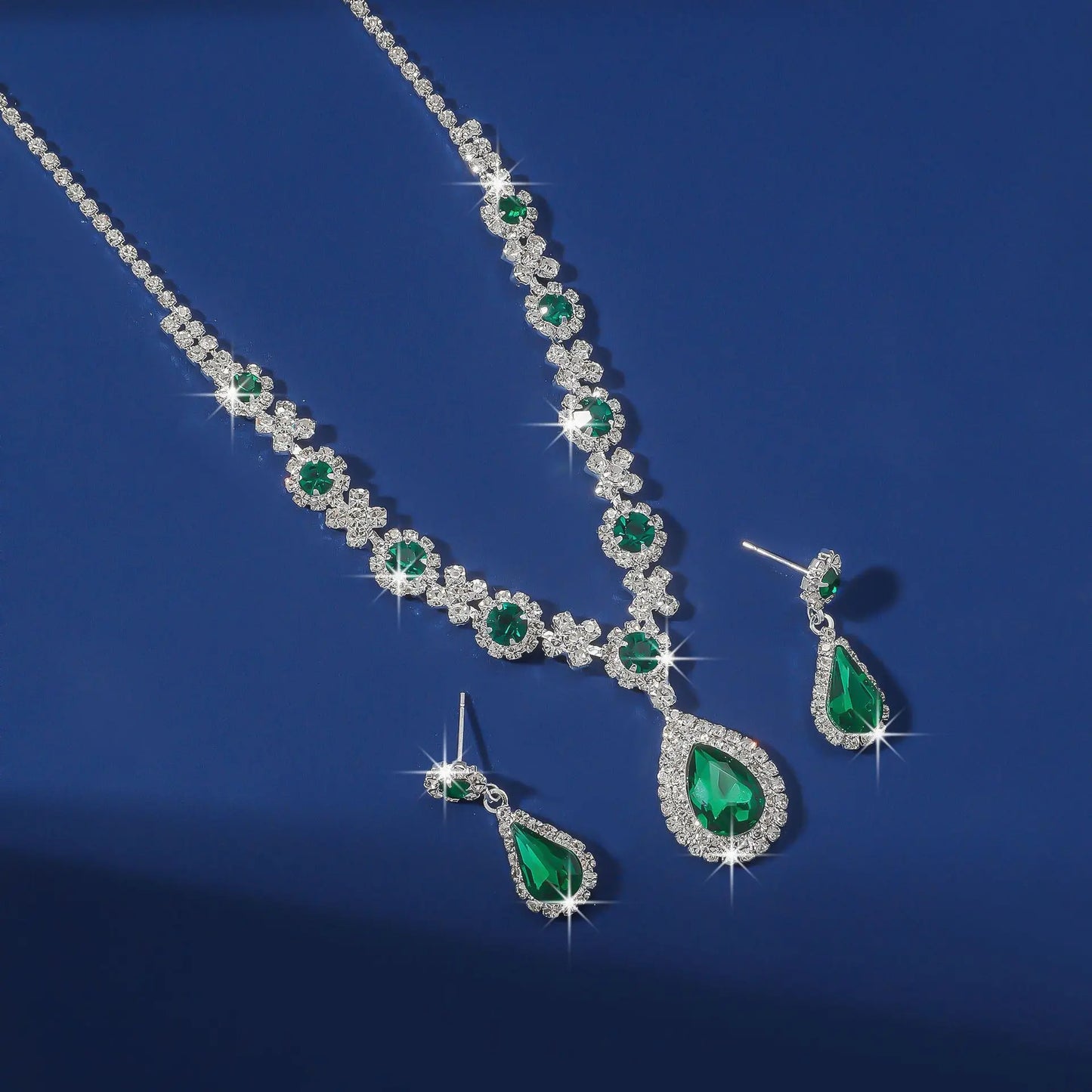 Elegant green waterdrop rhinestone jewelry set featuring necklace and earrings, perfect for special occasions.