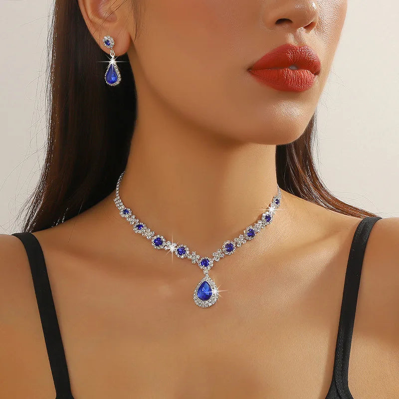 Elegant blue waterdrop rhinestone jewelry set featuring necklace and earrings, perfect for women on special occasions.