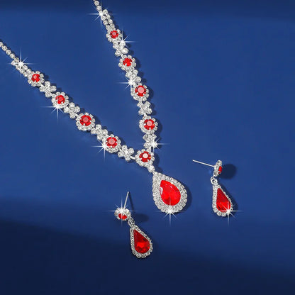 Elegant waterdrop rhinestone jewelry set featuring red gemstones, including necklace and earrings, perfect for women.